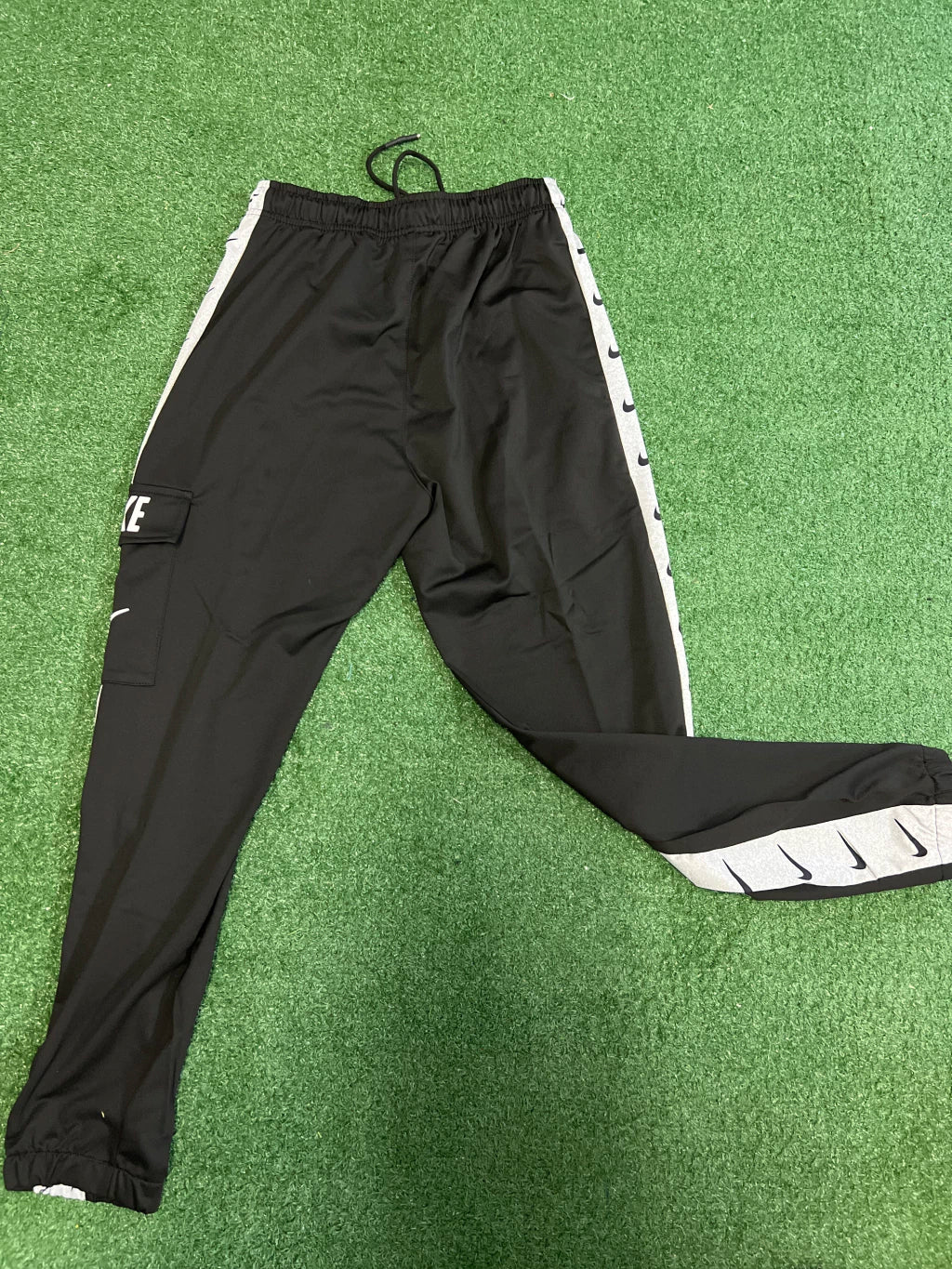 CalΓ§a Nike com Bolso