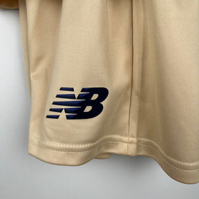 Kit Infantil FC Porto 23/24 New Balance - Dourado | Futmantos